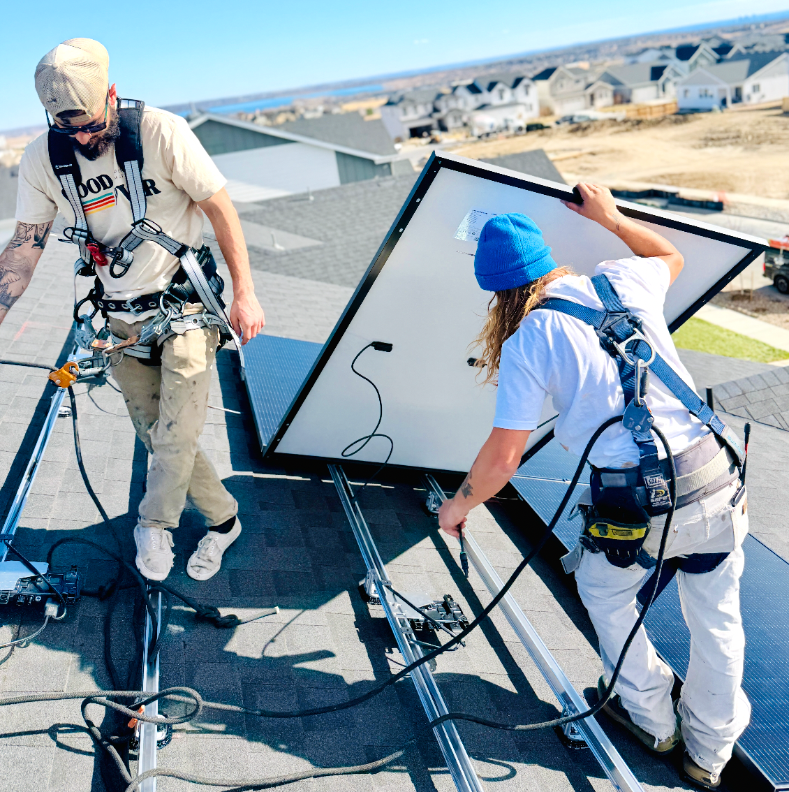 NABCEP-certified solar professionals installing panels on a residential rooftop